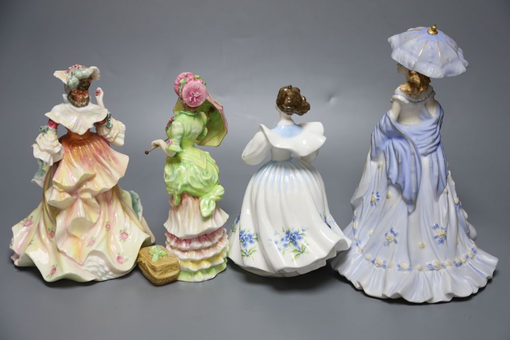 Four Royal Doulton / Coalport porcelain figures of elegant ladies
